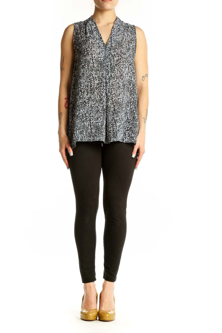 Gray speckled sleeveless button-front blouse by Violet & Claire, front view on model