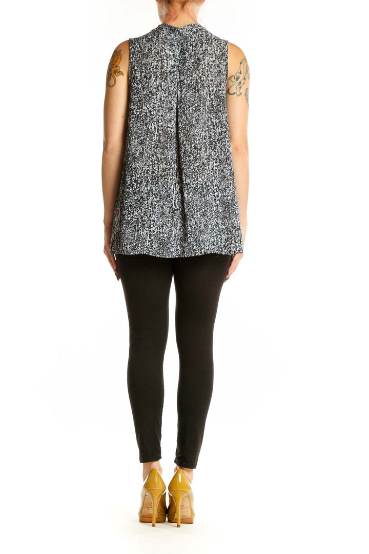 Gray speckled sleeveless button-front blouse by Violet & Claire, back view on model