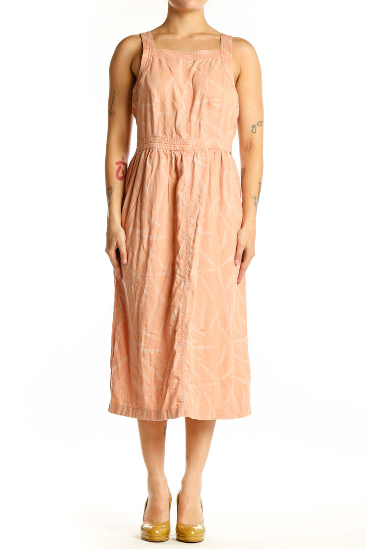 Front view of peach Tencel Lyocell midi dress with square neckline and defined waistband