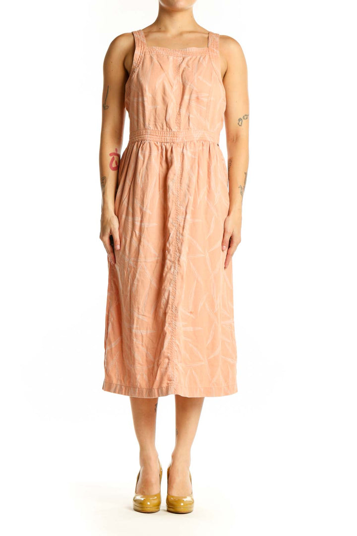 Front view of peach Tencel Lyocell midi dress with square neckline and defined waistband