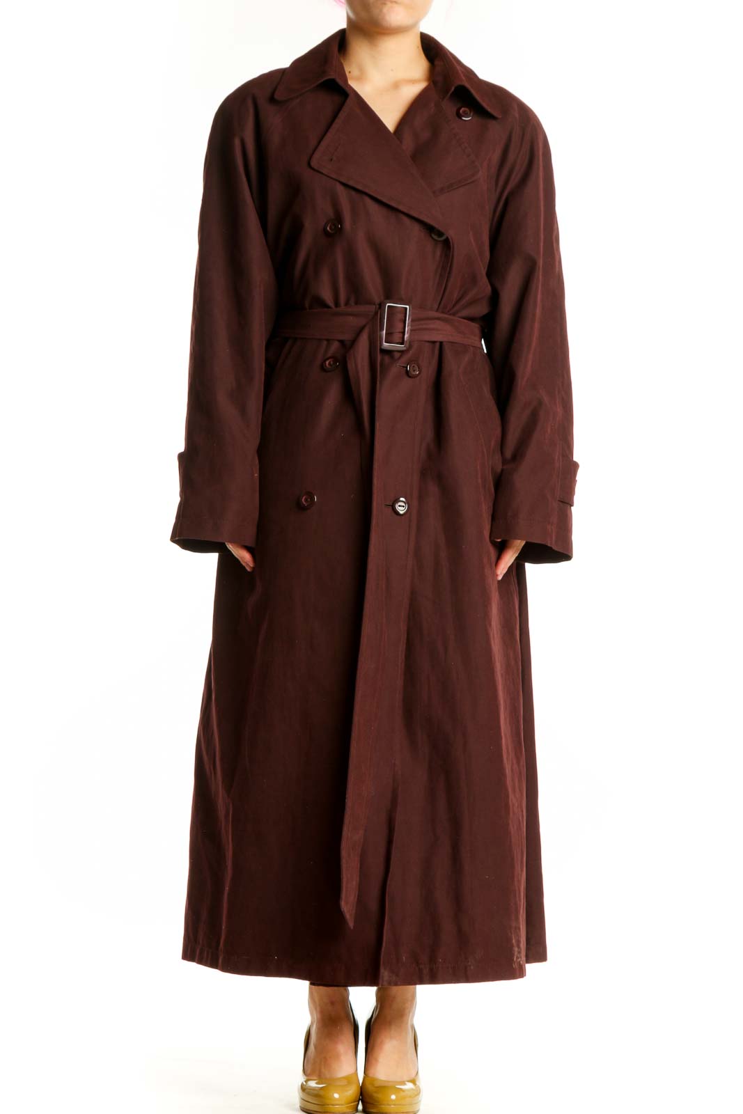 Burgundy double-breasted trench coat with adjustable belt and rolled cuffs, front view