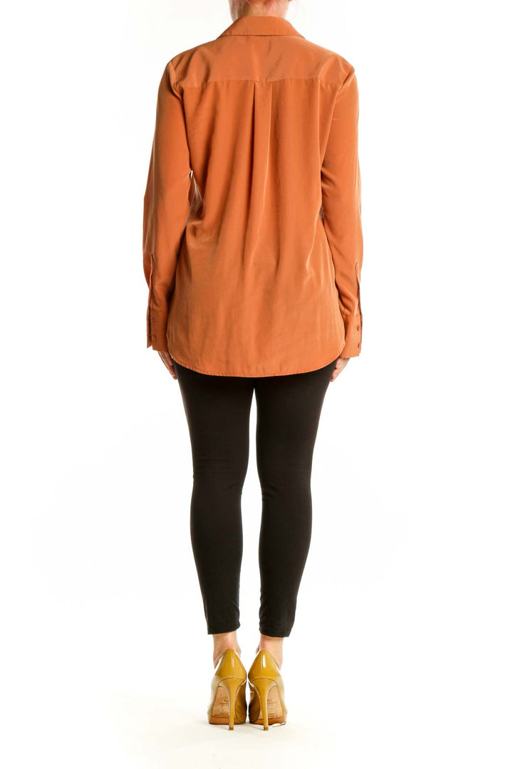 Nine West orange polyester button-up shirt back view showing full-length sleeves and button closure