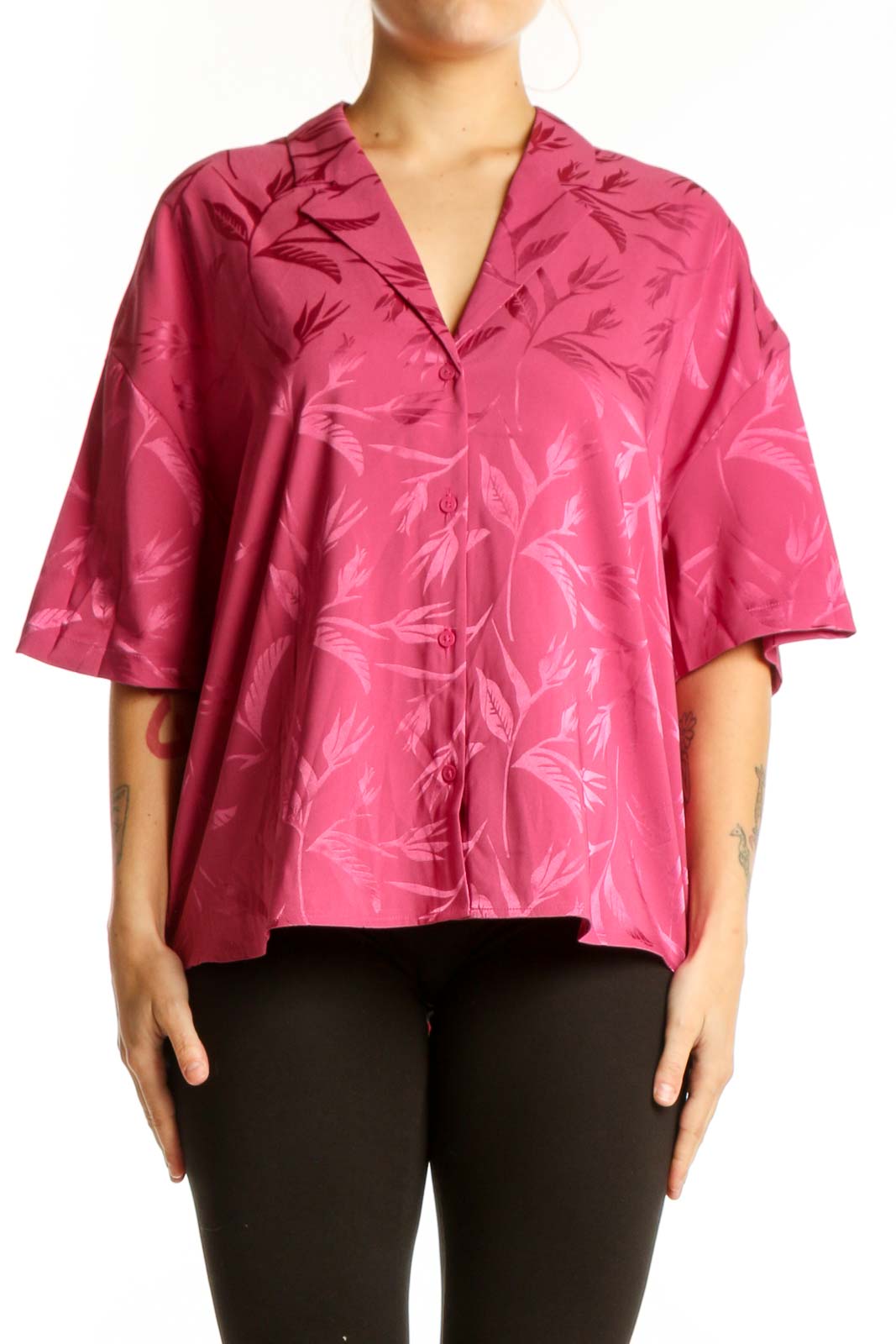 Pink floral ruffle button-up blouse with jacquard leaf pattern, front view on model