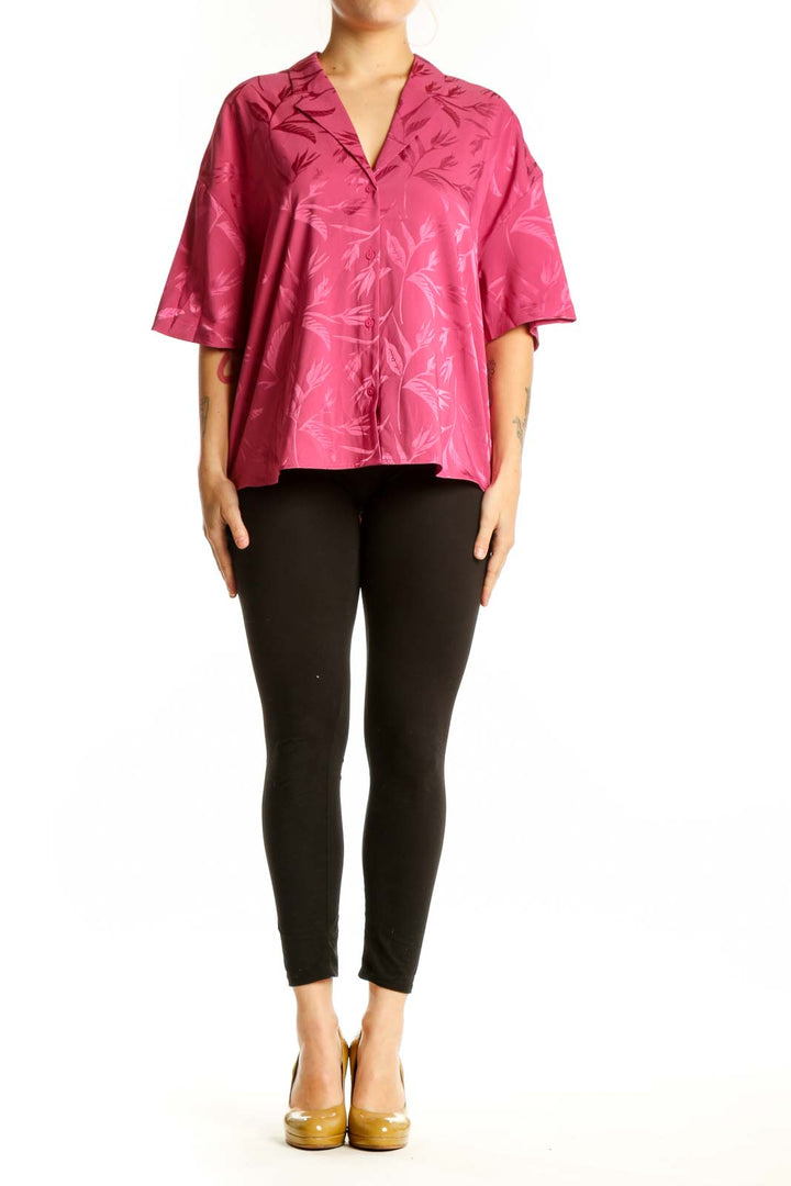 Pink floral ruffle button-up blouse with jacquard leaf pattern, front view on model