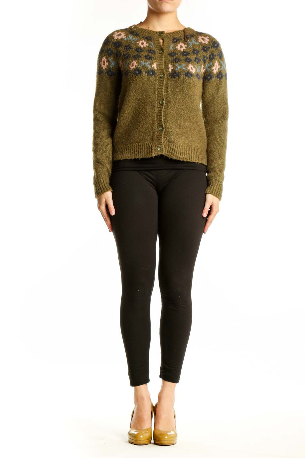 Olive green Fair Isle cardigan with cream and navy patterned yoke, button-front closure, worn with black pants
