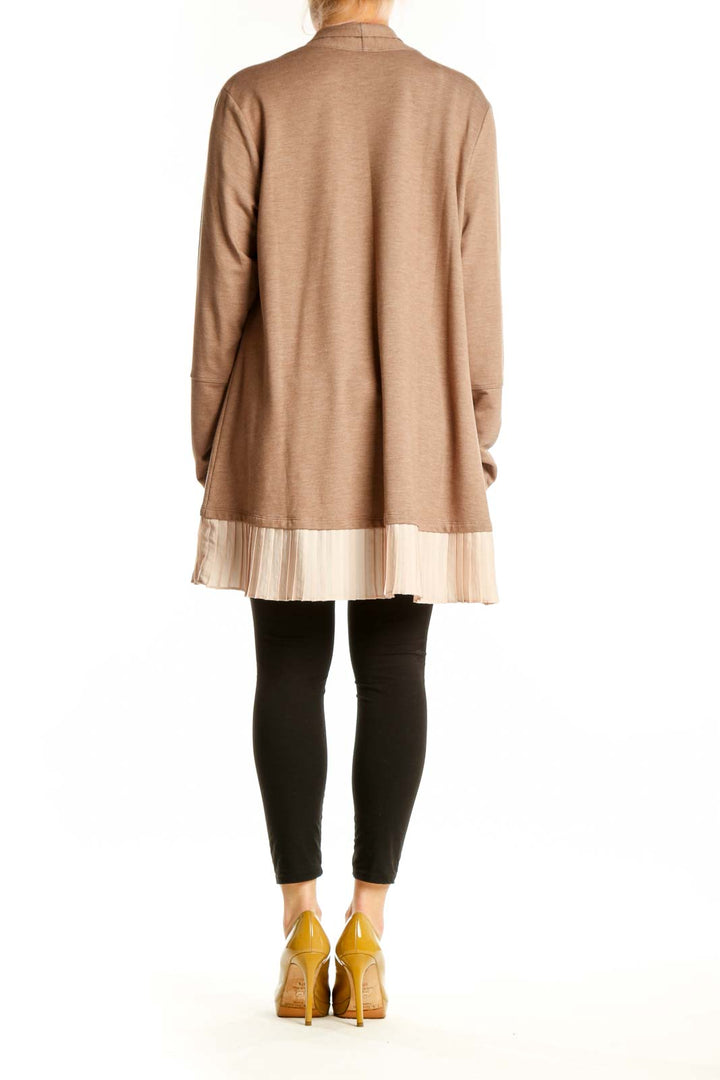 Beige open-front cardigan with pleated cream hem detail, back view