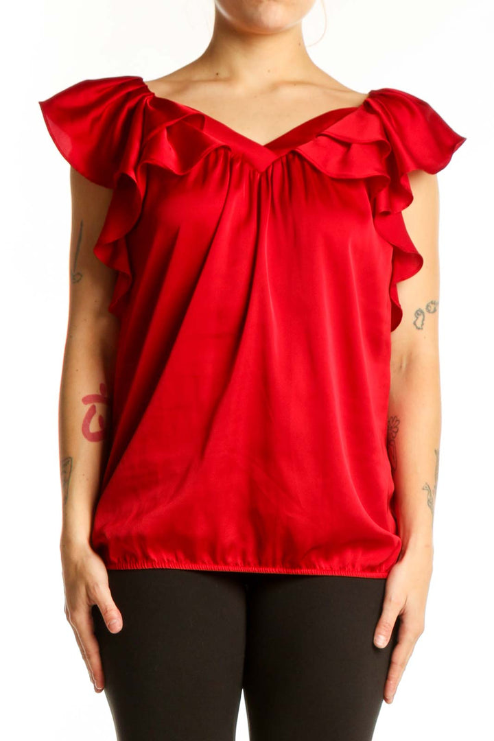 Red ruffle off-shoulder blouse with dramatic cap sleeves and gathered waist, front view