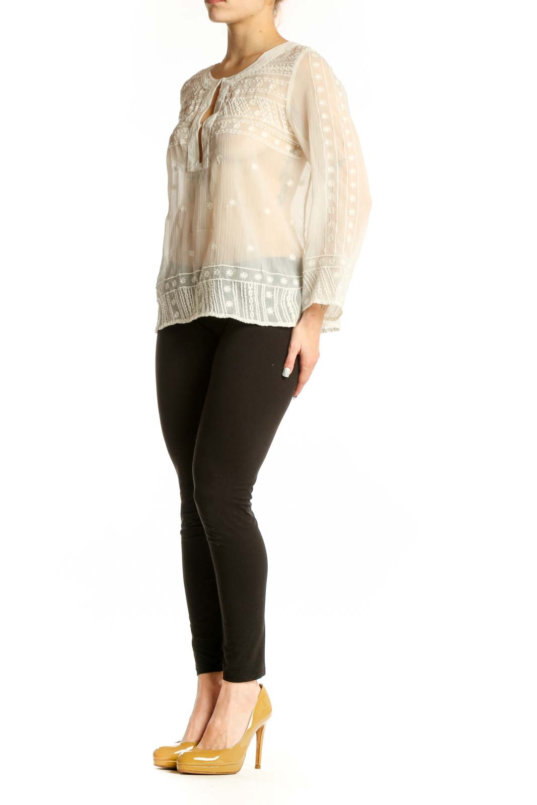 Cream embroidered Mango blouse with keyhole neckline and bell sleeves, front view on model