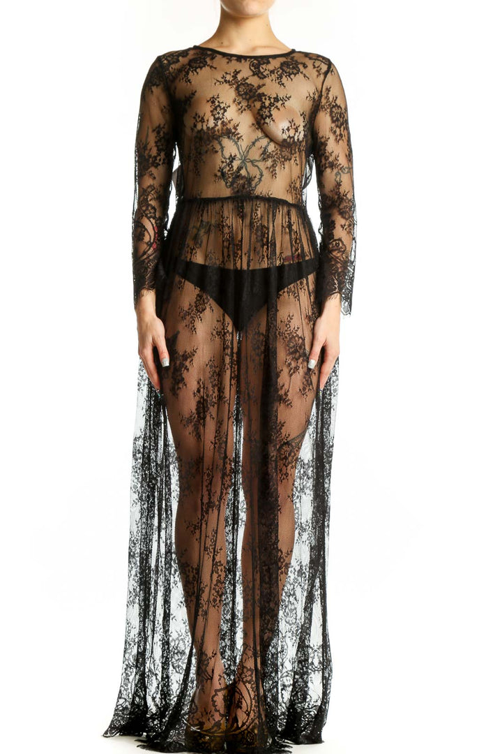Black lace long sleeve maxi dress with floral overlay and fitted waistband, front view