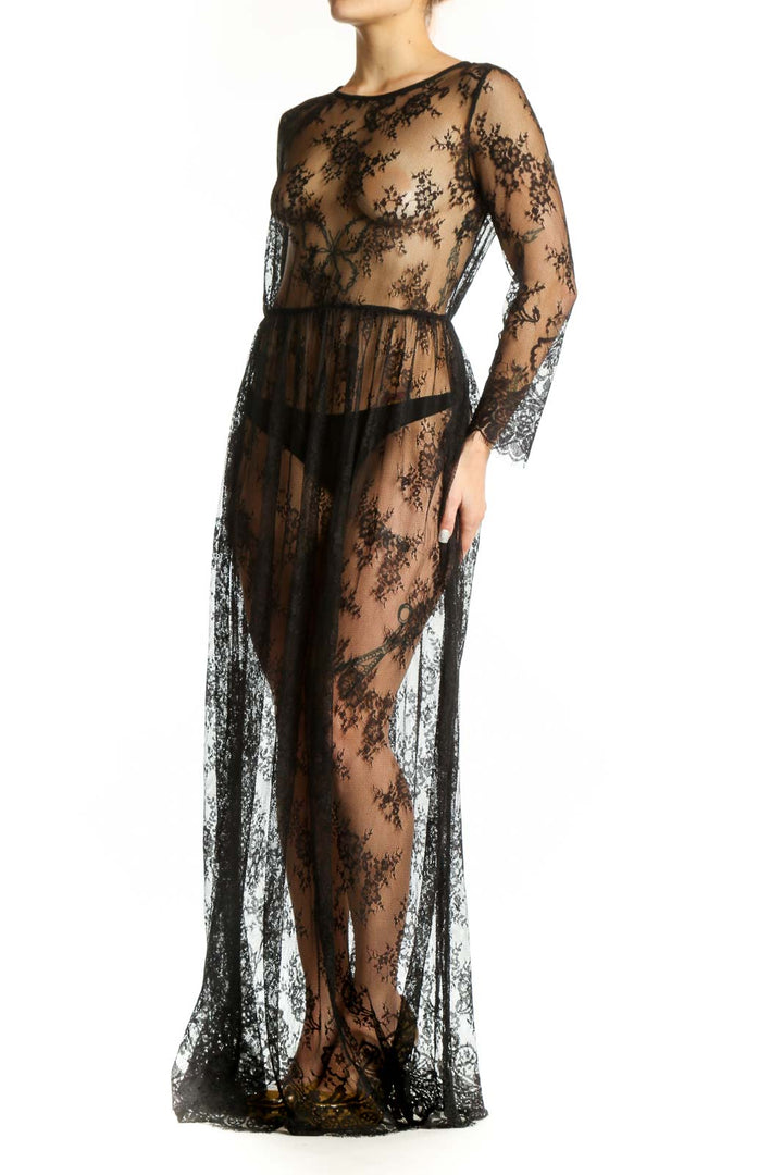 Black lace long sleeve maxi dress with floral overlay and fitted waistband, front view