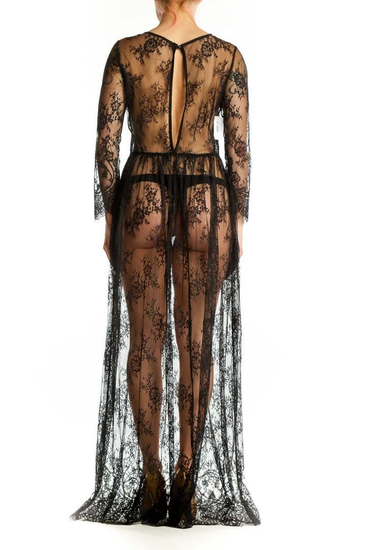 Black lace long sleeve maxi dress with floral overlay and pleated detail, back view