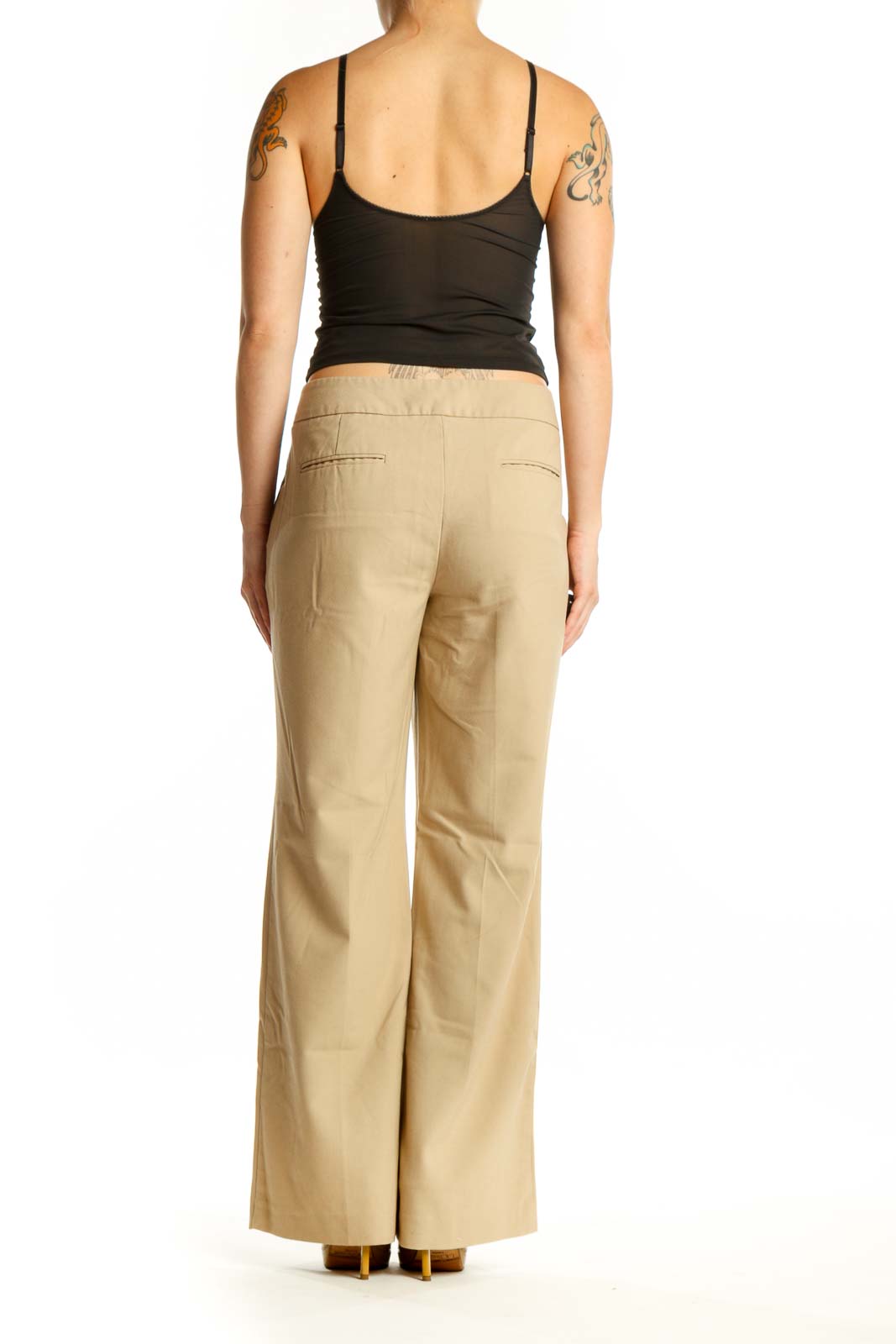 Beige wide-leg pants back view, displaying elegant drape and comfortable silhouette