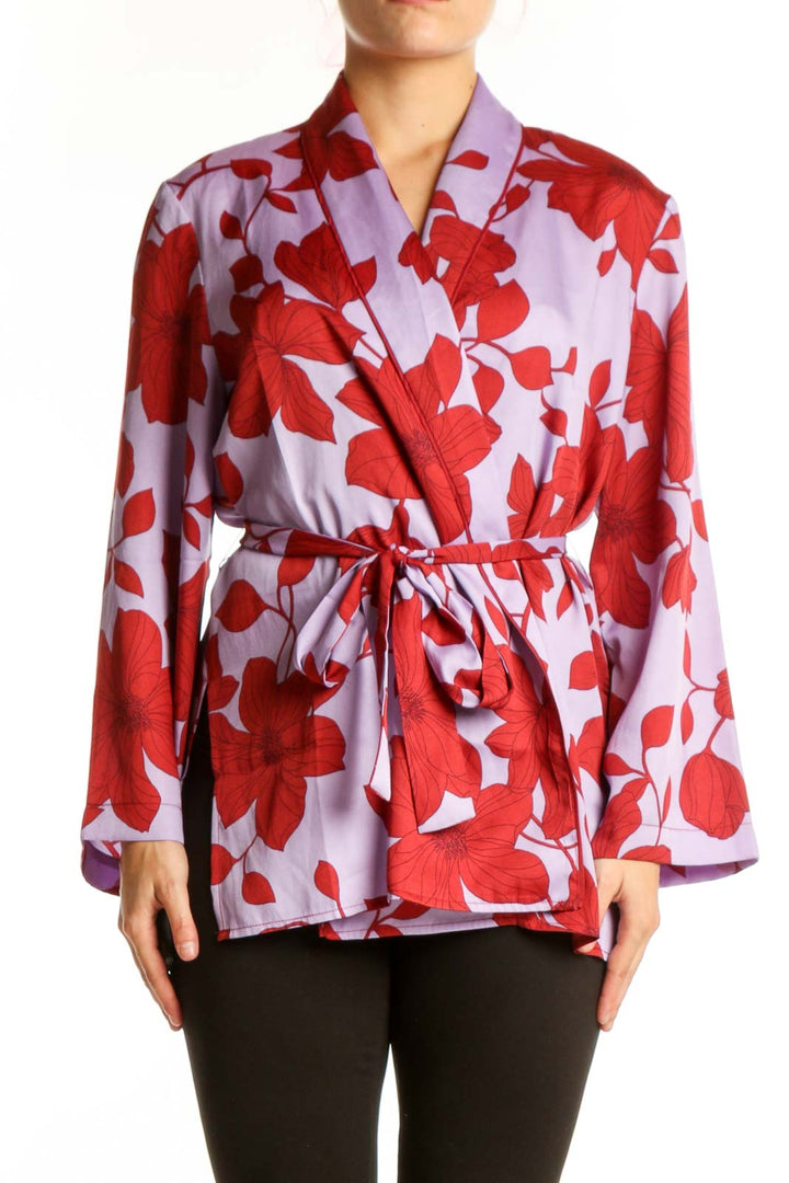 Ann Taylor red and lavender floral wrap blouse with long sleeves and adjustable tie belt, front view