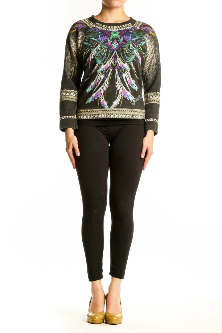 Black wool jacquard sweater with vibrant embroidered butterfly design and gold trim, front view