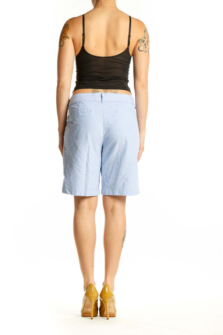 Back view of light blue cotton Bermuda shorts from J.Crew, size M, showing the traditional button-fly closure and relaxed silhouette