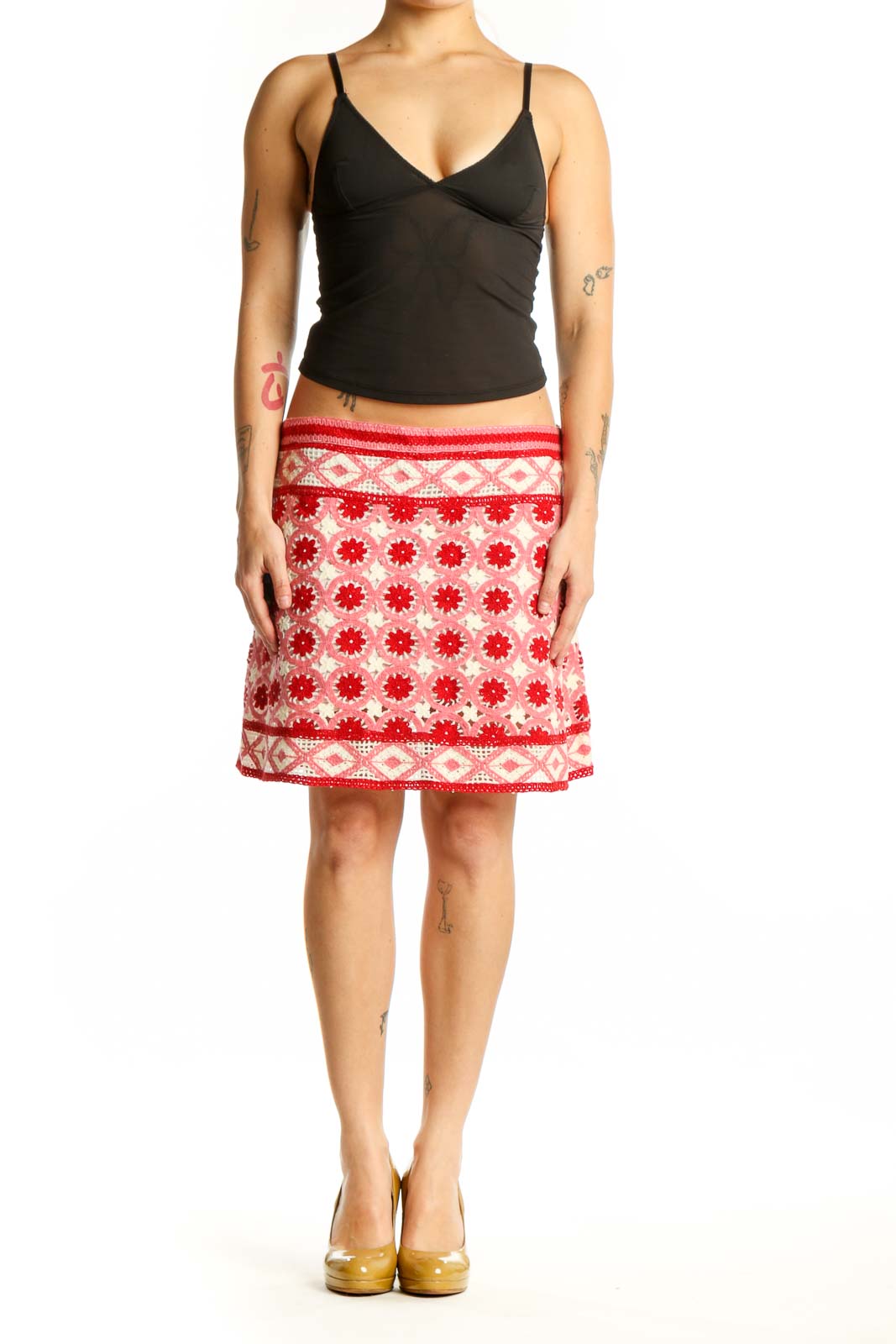 Red and cream floral A-line skirt with geometric border pattern, front view