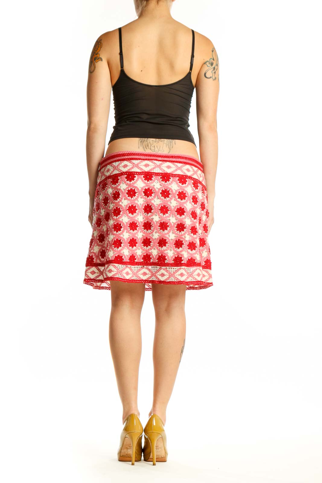 Red and cream floral A-line skirt with geometric border pattern, back view