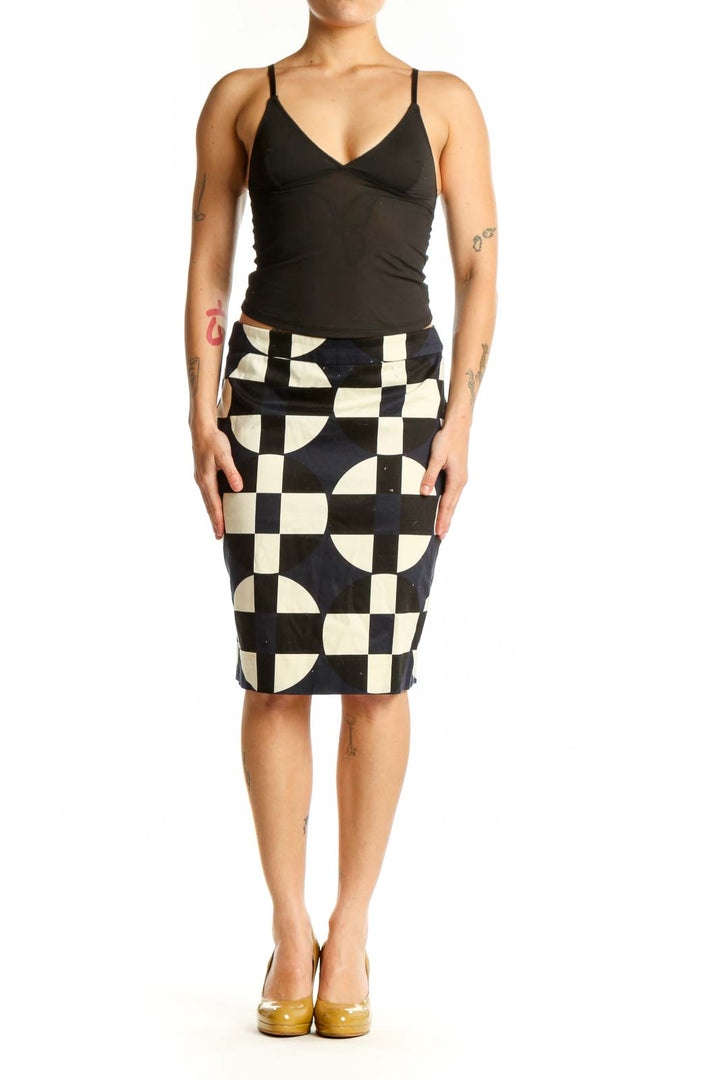 Black and cream checkered pencil skirt with geometric circular motifs, front view