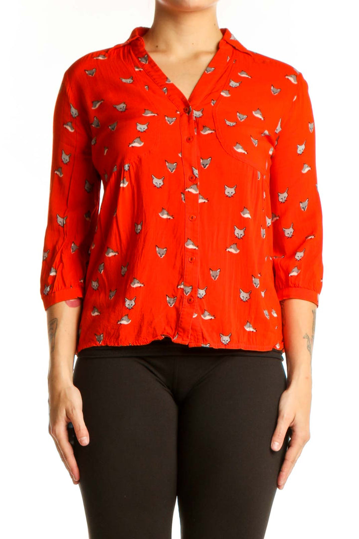 Red cat print button-up blouse with peplum waist detail, front view on model