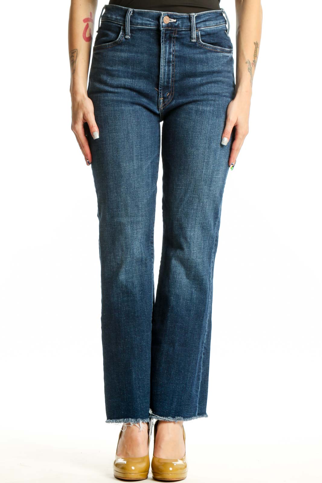 Front view of Mother blue cropped flare jeans with high-rise waist and raw frayed hem on model