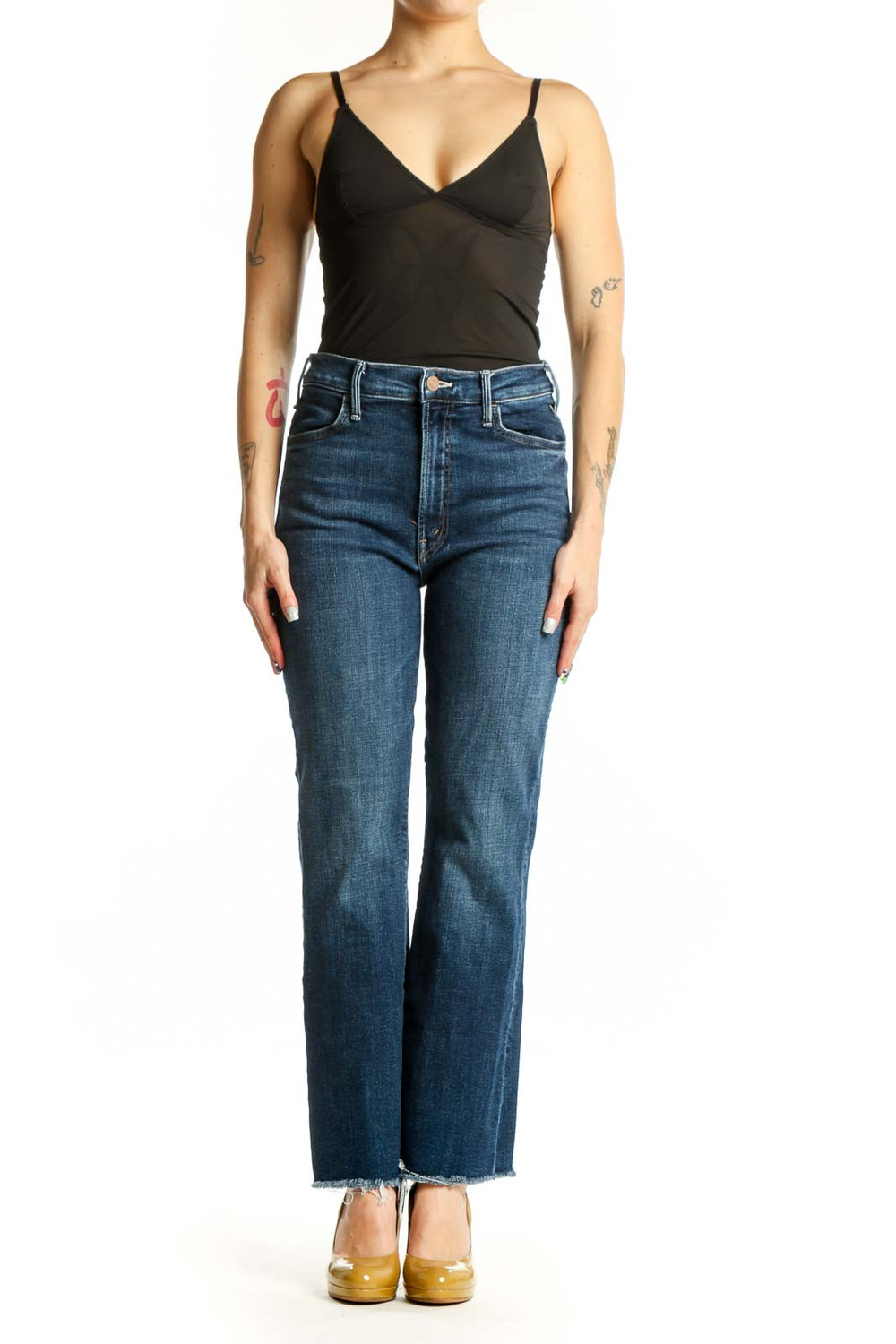 Front view of Mother blue cropped flare jeans with high-rise waist and raw frayed hem on model