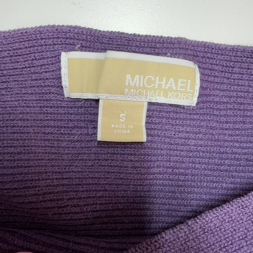 Purple ruffle sleeve top by Michael Kors with flutter sleeves, back view