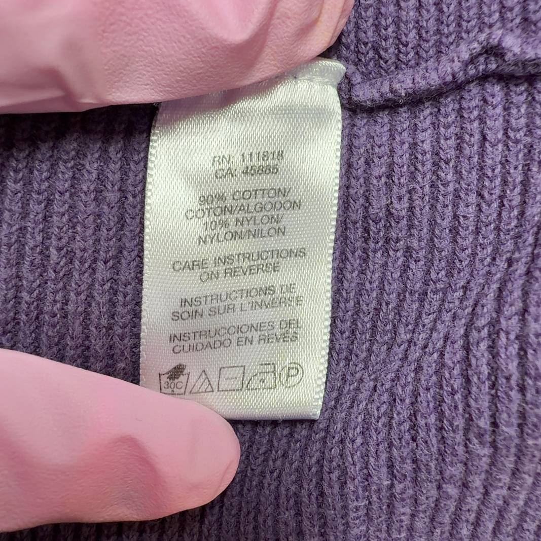 Purple ruffle sleeve top by Michael Kors with flutter sleeves, back view