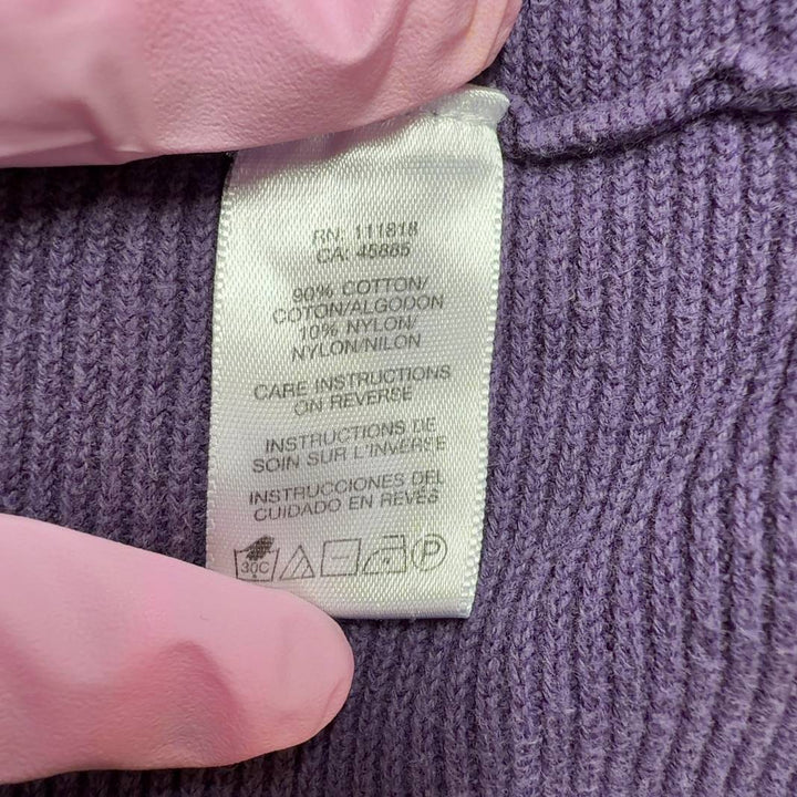 Purple ruffle sleeve top by Michael Kors with flutter sleeves, back view