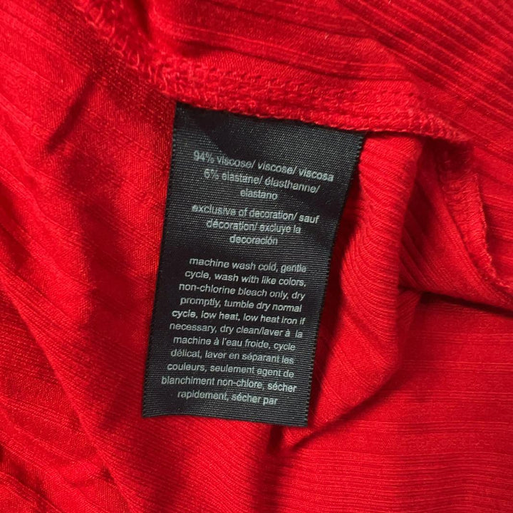 Red maxi t-shirt dress with black trim sleeves by Tommy Hilfiger, back view on model