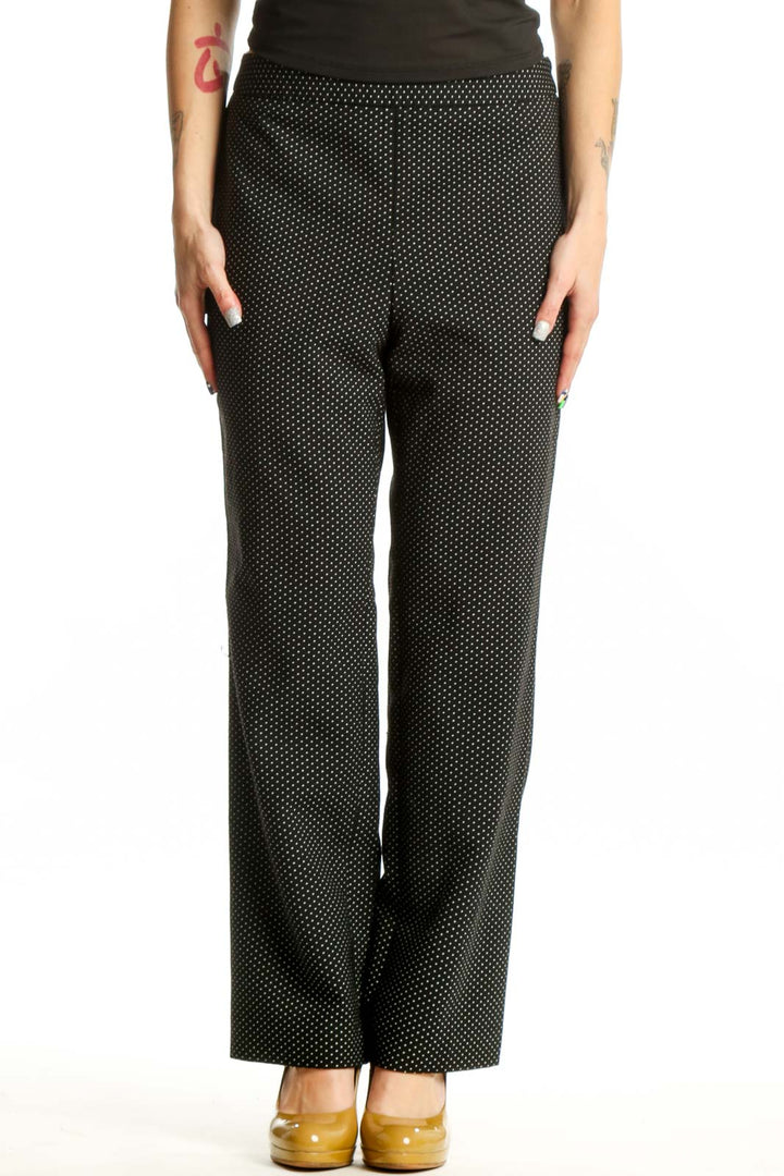 Black polka dot wide-leg pants with elastic waistband, front view