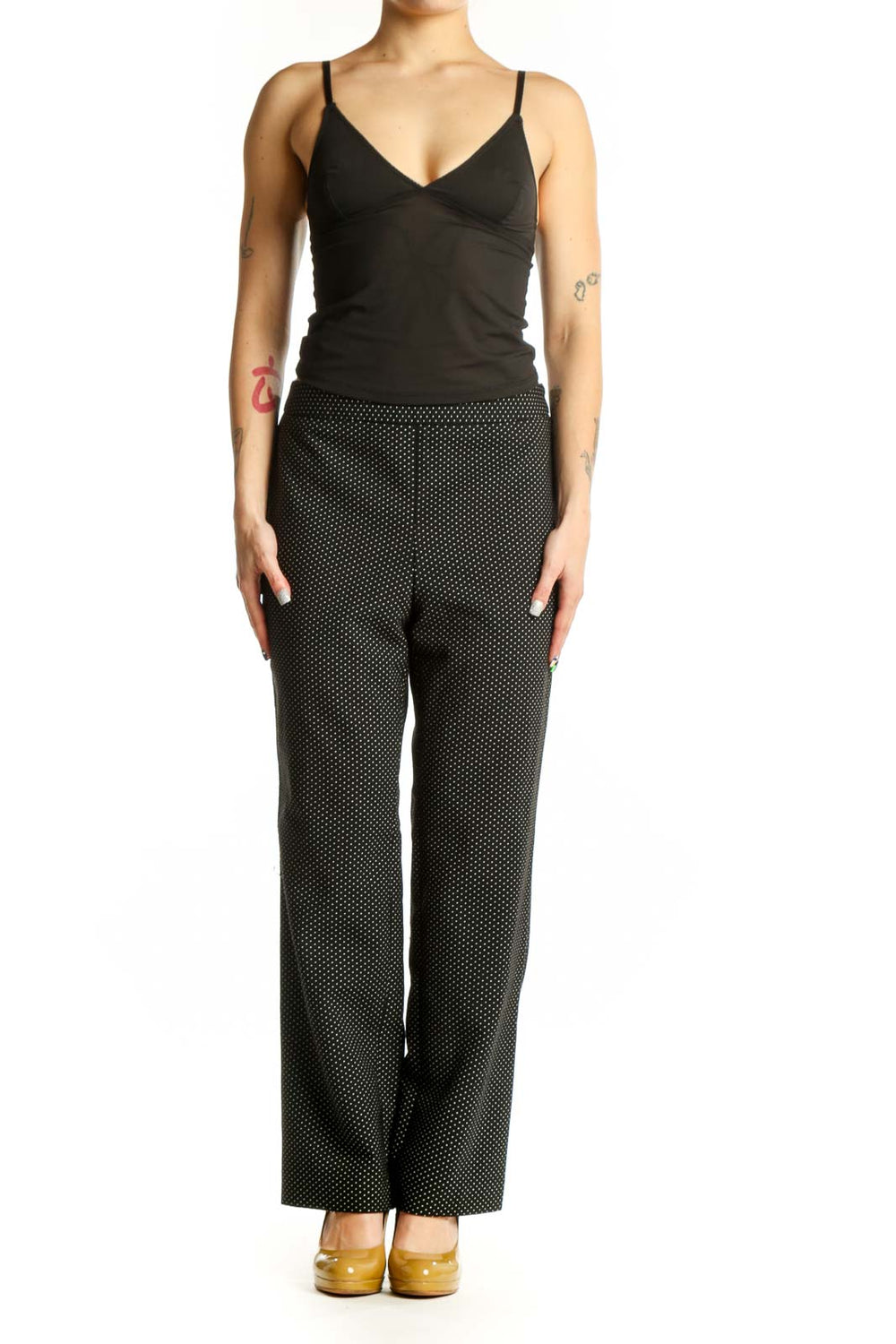Black polka dot wide-leg pants with elastic waistband, front view
