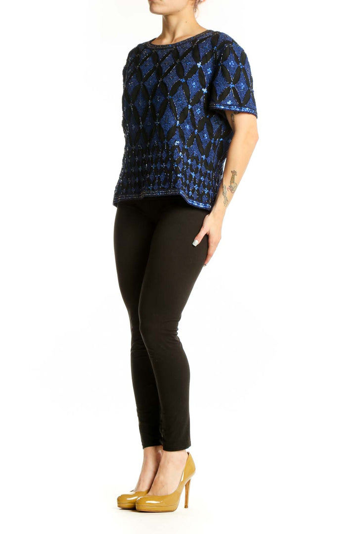 Navy blue silk top with geometric sequin and beadwork pattern, short sleeves, front view