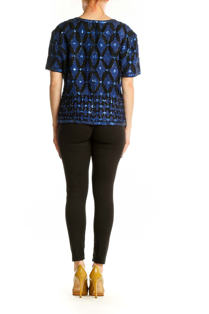 Navy blue beaded silk top with diamond sequin pattern, short sleeves, back view