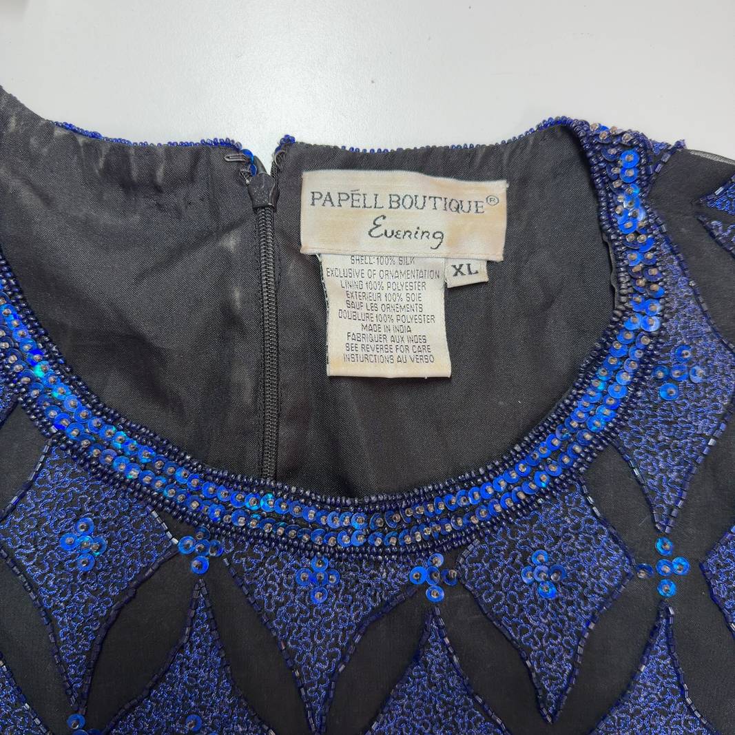 Navy blue beaded silk top with diamond sequin pattern, short sleeves, back view