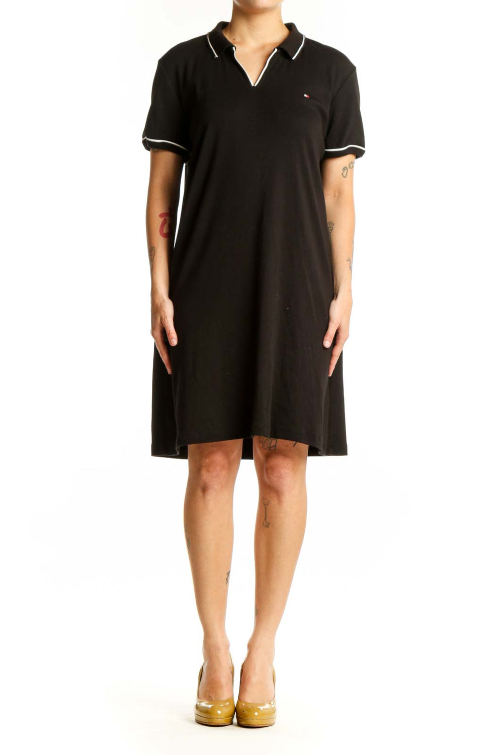 Black cotton polo shirt dress with white-tipped collar and short sleeves, front view