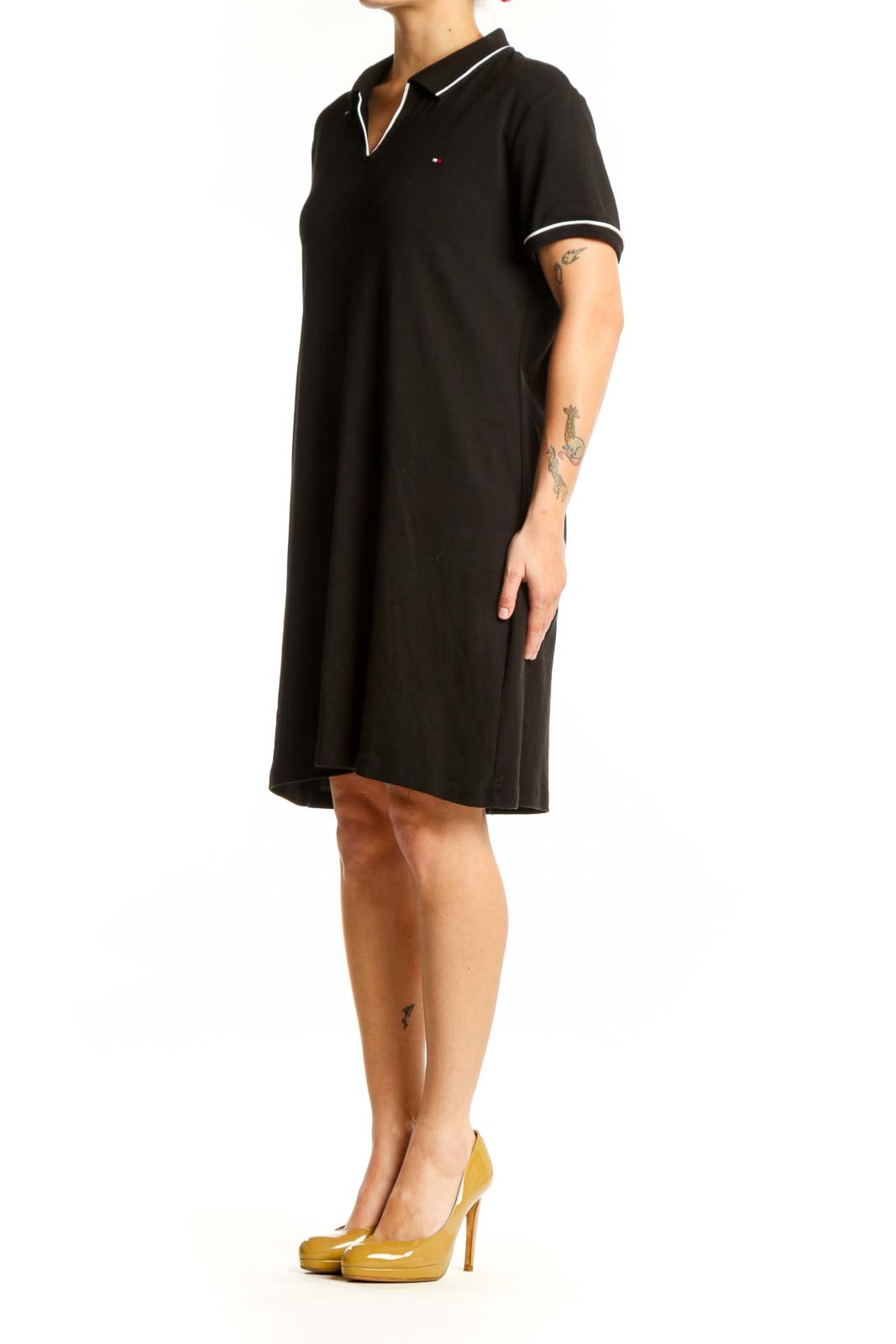 Black cotton polo shirt dress with white-tipped collar and short sleeves, front view