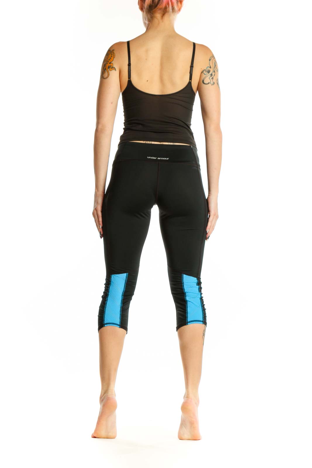 Black capri activewear leggings back view, showing supportive waistband and capri length