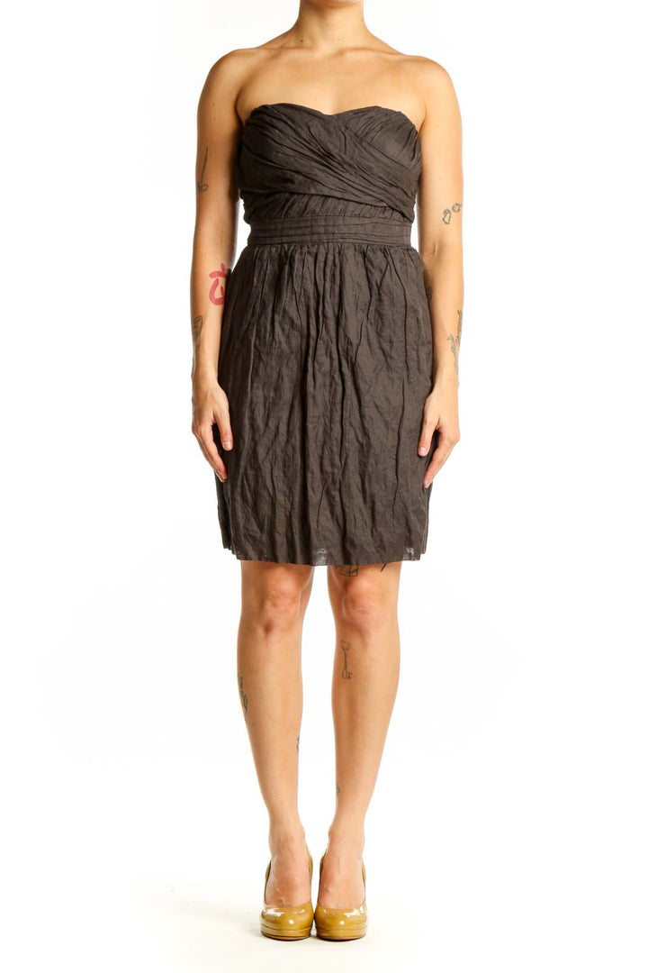 Black strapless J.Crew dress with ruched sweetheart neckline and gathered skirt, front view