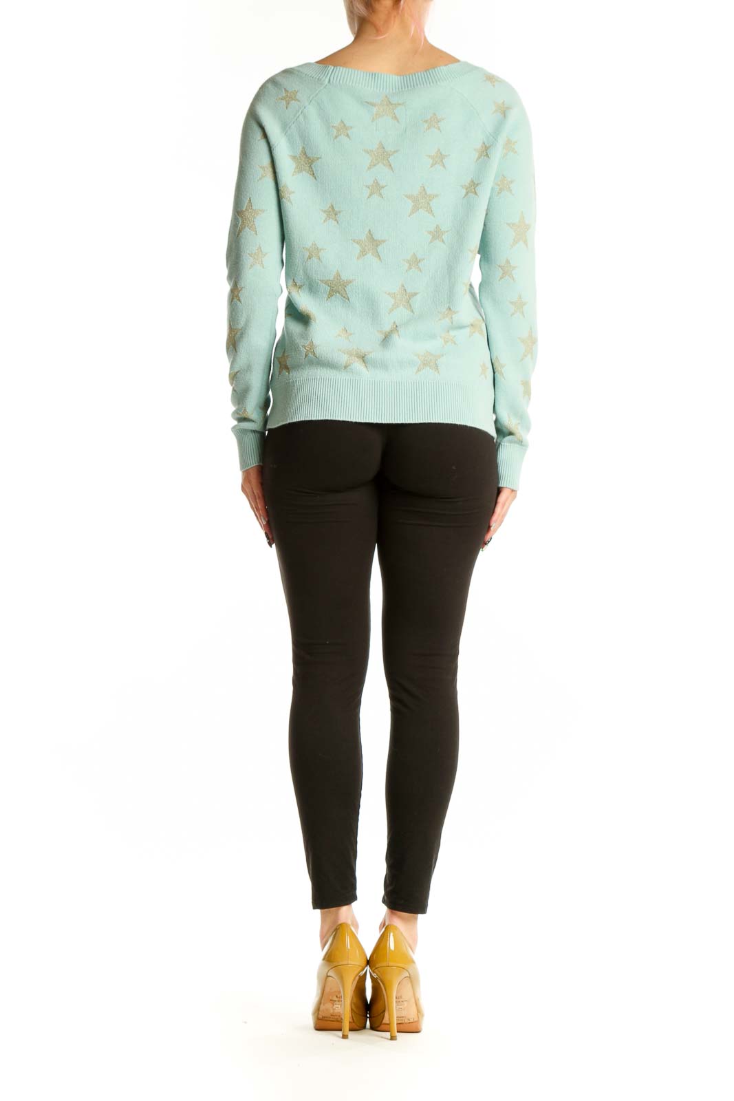 Mint green star pattern sweater, back view on model showing relaxed fit and design