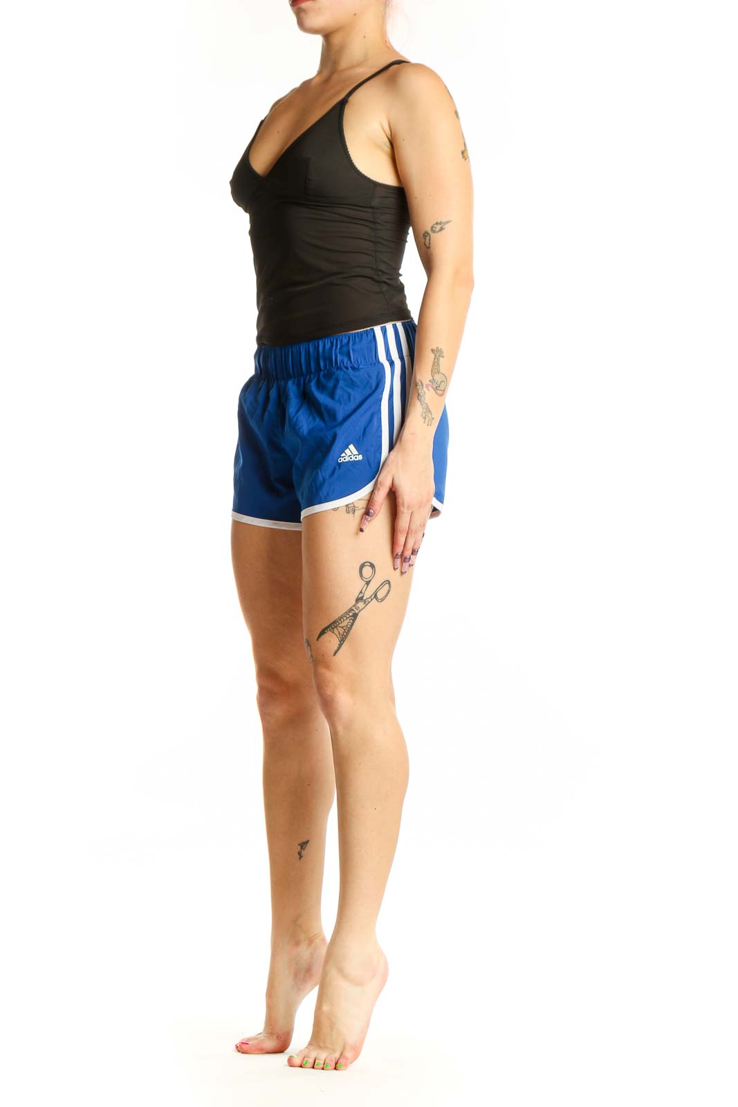 Front view of blue Adidas athletic shorts with white trim and elastic waistband, size XS