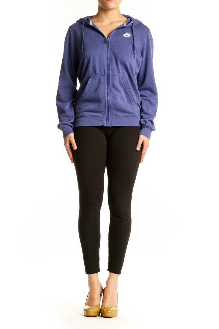 Navy Nike zip-up hoodie with Swoosh logo, front view on model