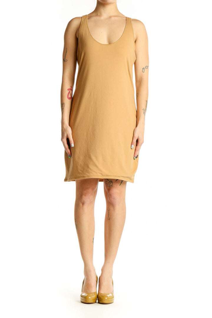 Gold sleeveless tank dress with scoop neckline, front view on model