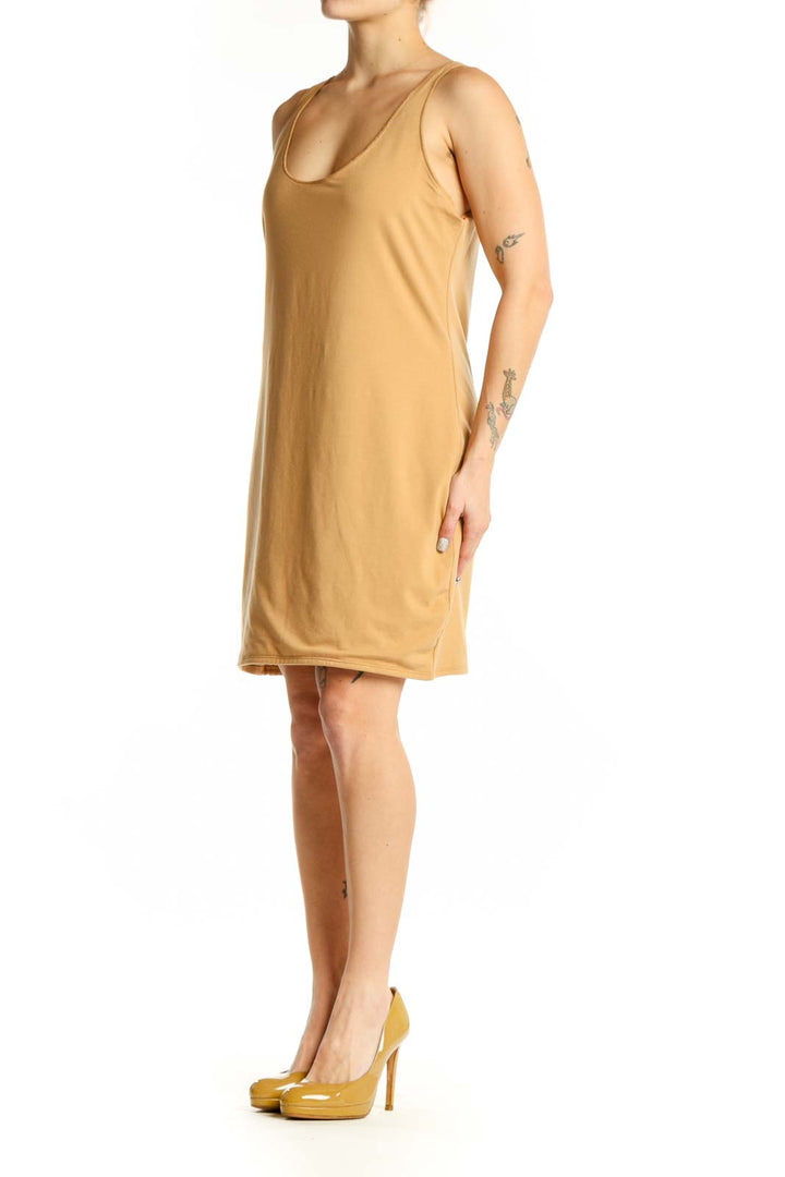 Gold sleeveless tank dress with scoop neckline, front view on model