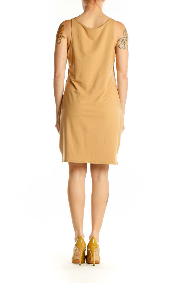 Gold sleeveless tank dress with scoop neckline, back view on model