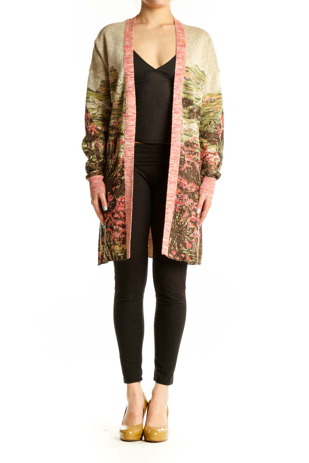 Multicolor floral cardigan with metallic accents and pink ribbed trim worn over black top, front view