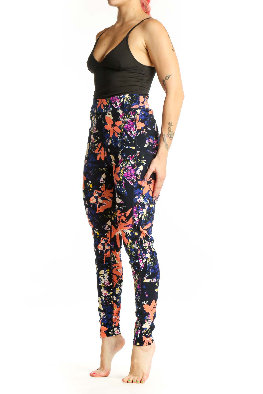 Navy floral print Pop Fit activewear leggings front view, featuring vibrant orange, pink, and yellow botanical design