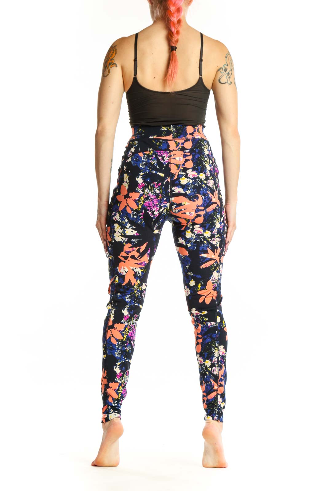 Navy floral print Pop Fit activewear leggings back view, showing full-length fit and colorful floral pattern