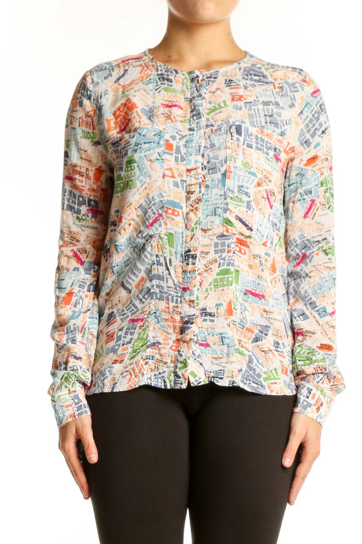 Front view of multicolor newspaper print rayon blouse by Mango with button-front closure and long sleeves