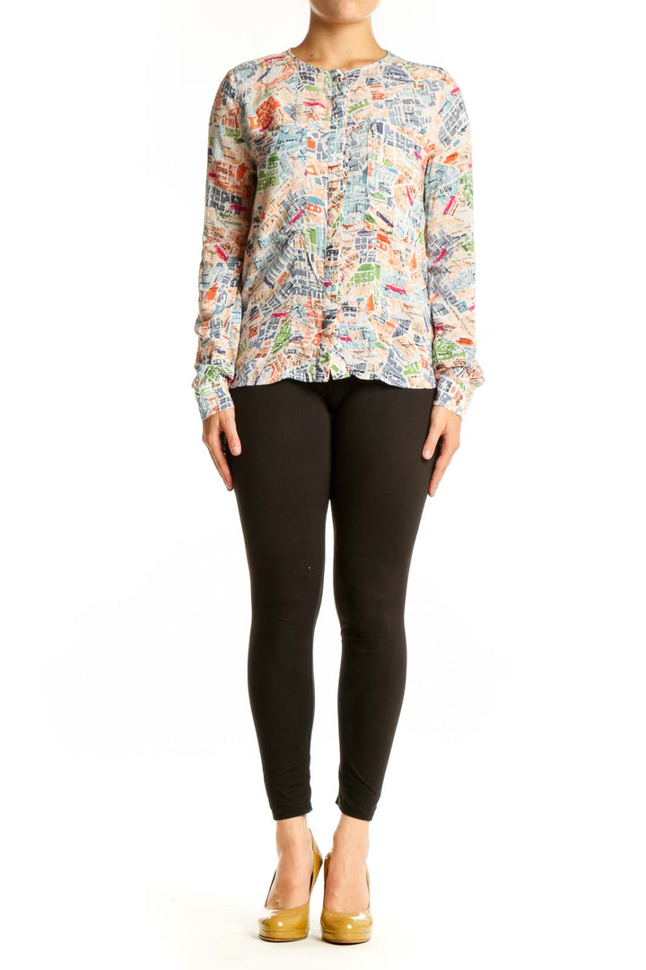 Front view of multicolor newspaper print rayon blouse by Mango with button-front closure and long sleeves