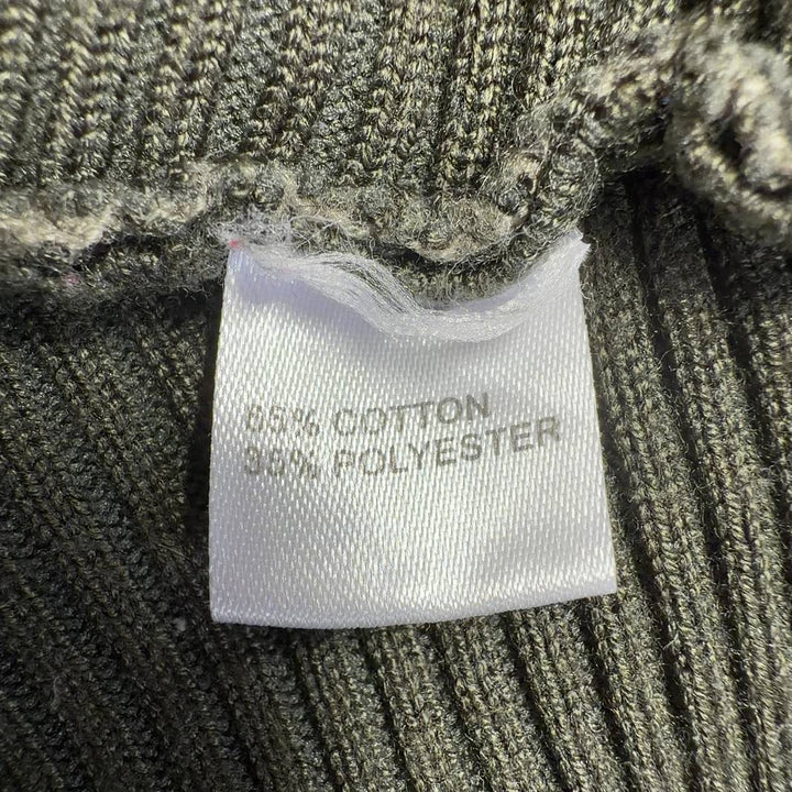 Olive green striped knit sweater back view showing center stripe detail and relaxed silhouette